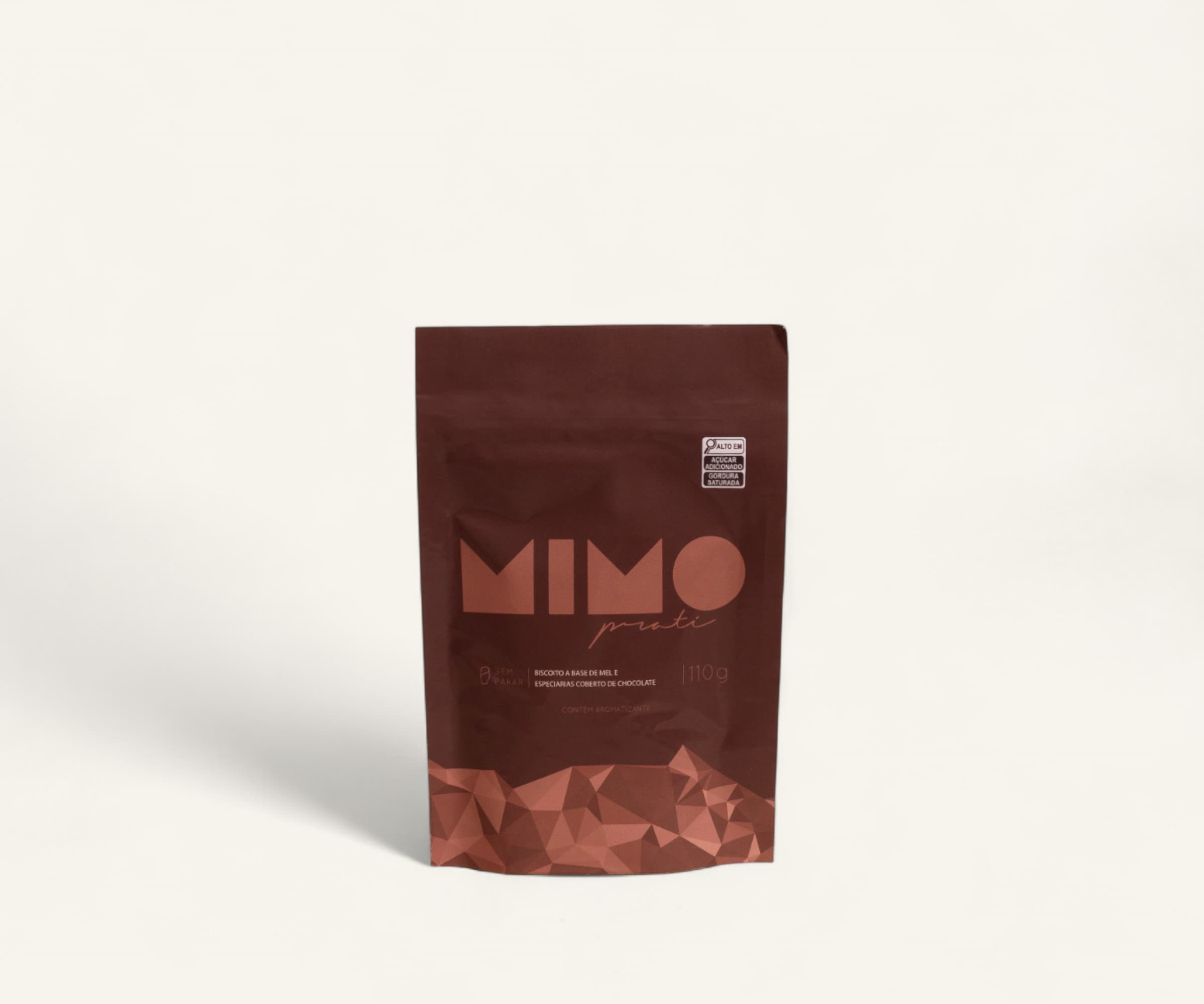 Biscoito a base de mel e especiarias coberto de chocolate Mimo 110g