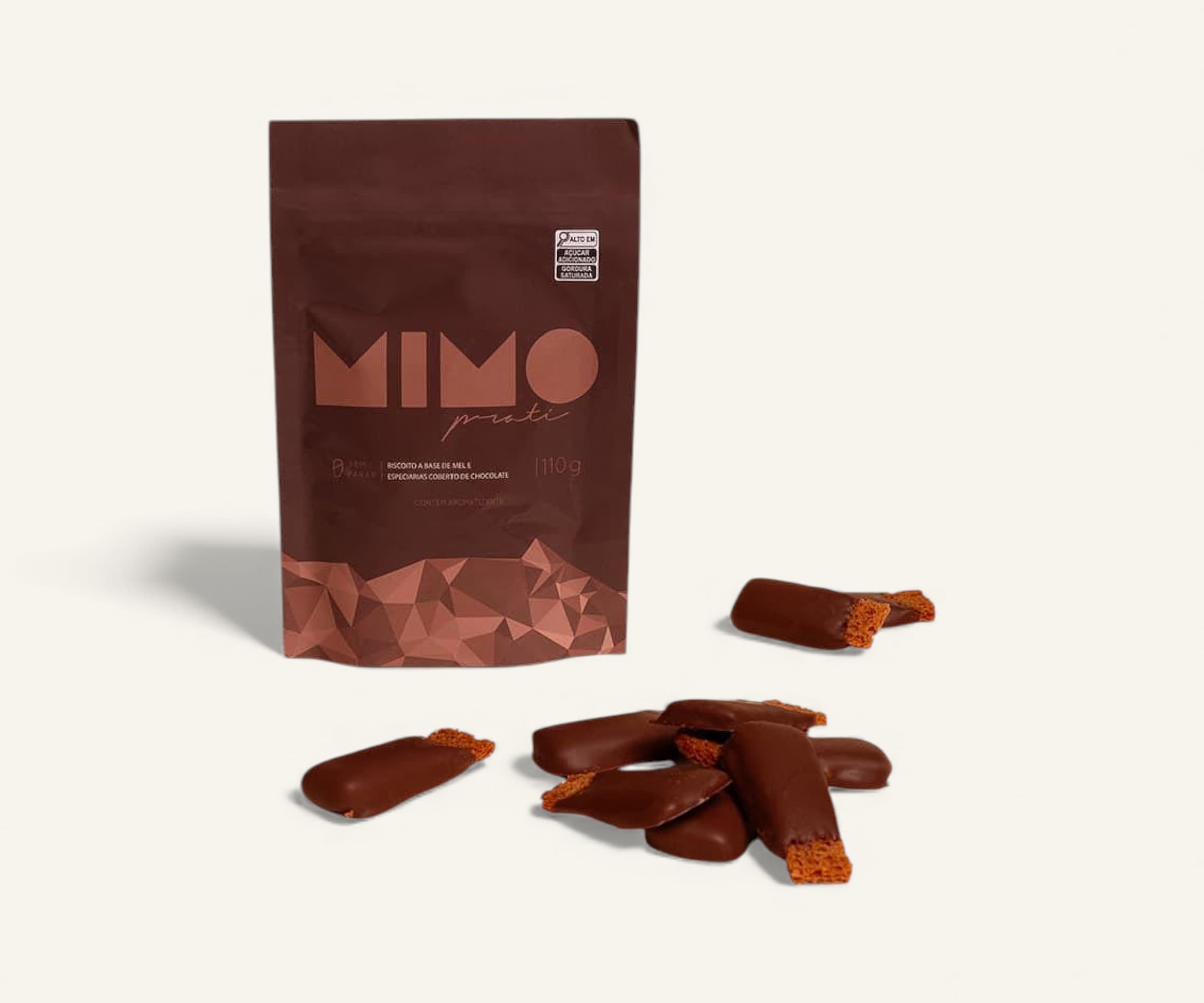 Biscoito a base de mel e especiarias coberto de chocolate Mimo 110g