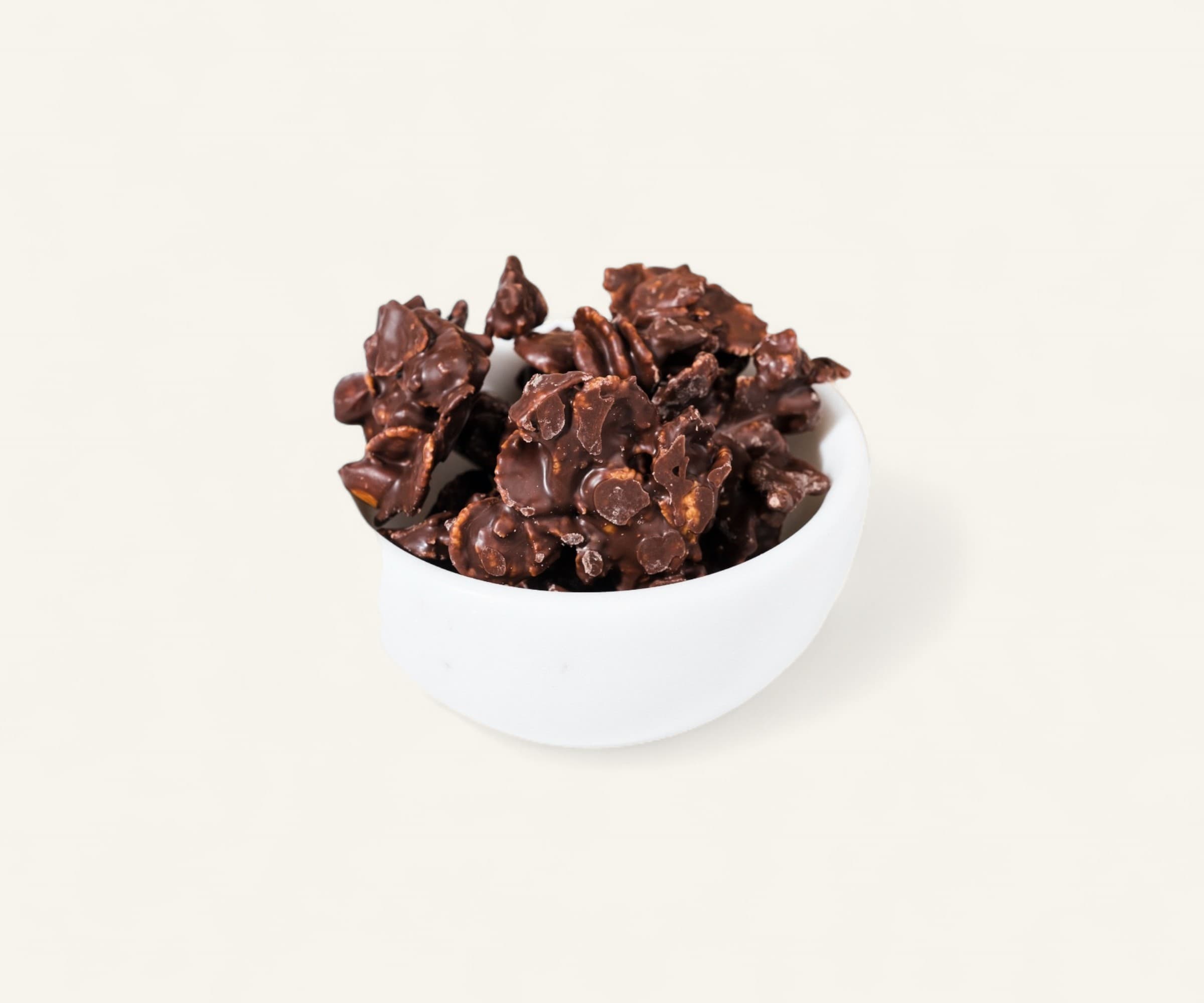 Biscoito chocoflakes cereal e amêndoa envoltos em chocolate 100g