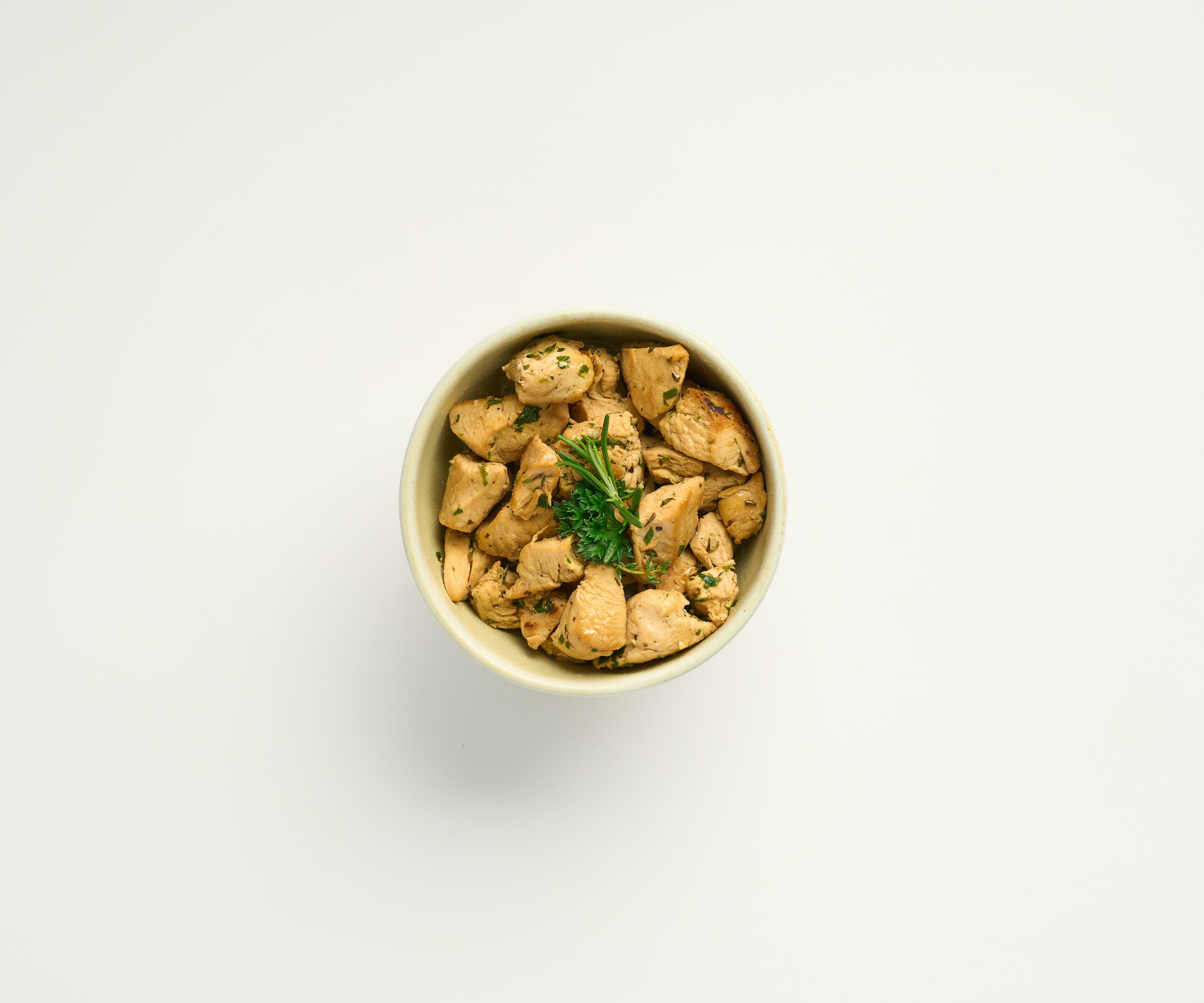 Iscas de frango com alho e ervas porção de 130g